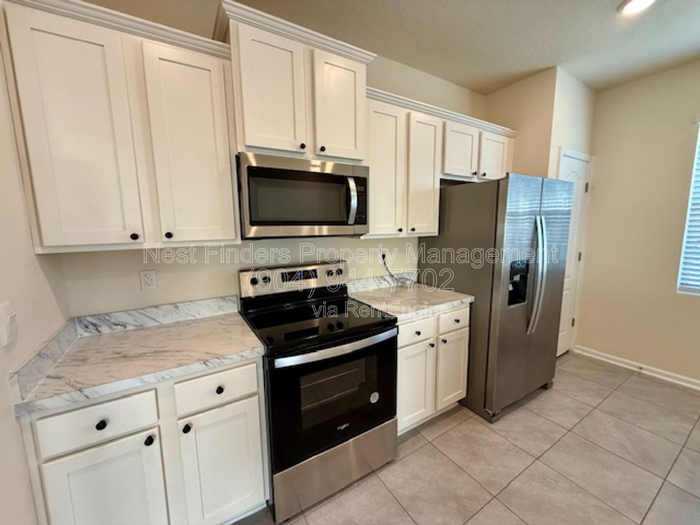 Charming three-bedroom, 2.5-bathroom end-unit townhome for rent in the desirable Rivergate community property image