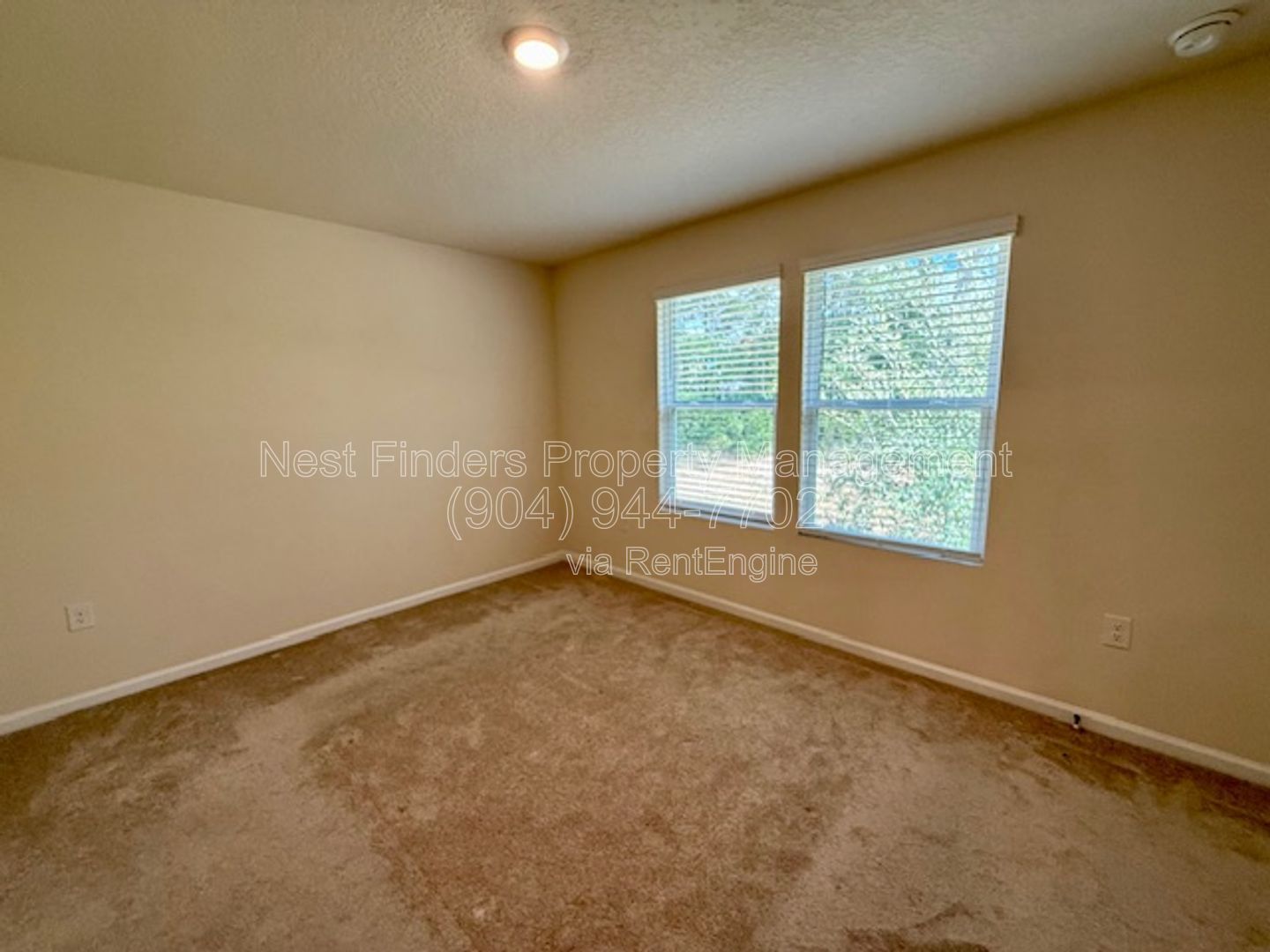 Charming three-bedroom, 2.5-bathroom end-unit townhome for rent in the desirable Rivergate community property image