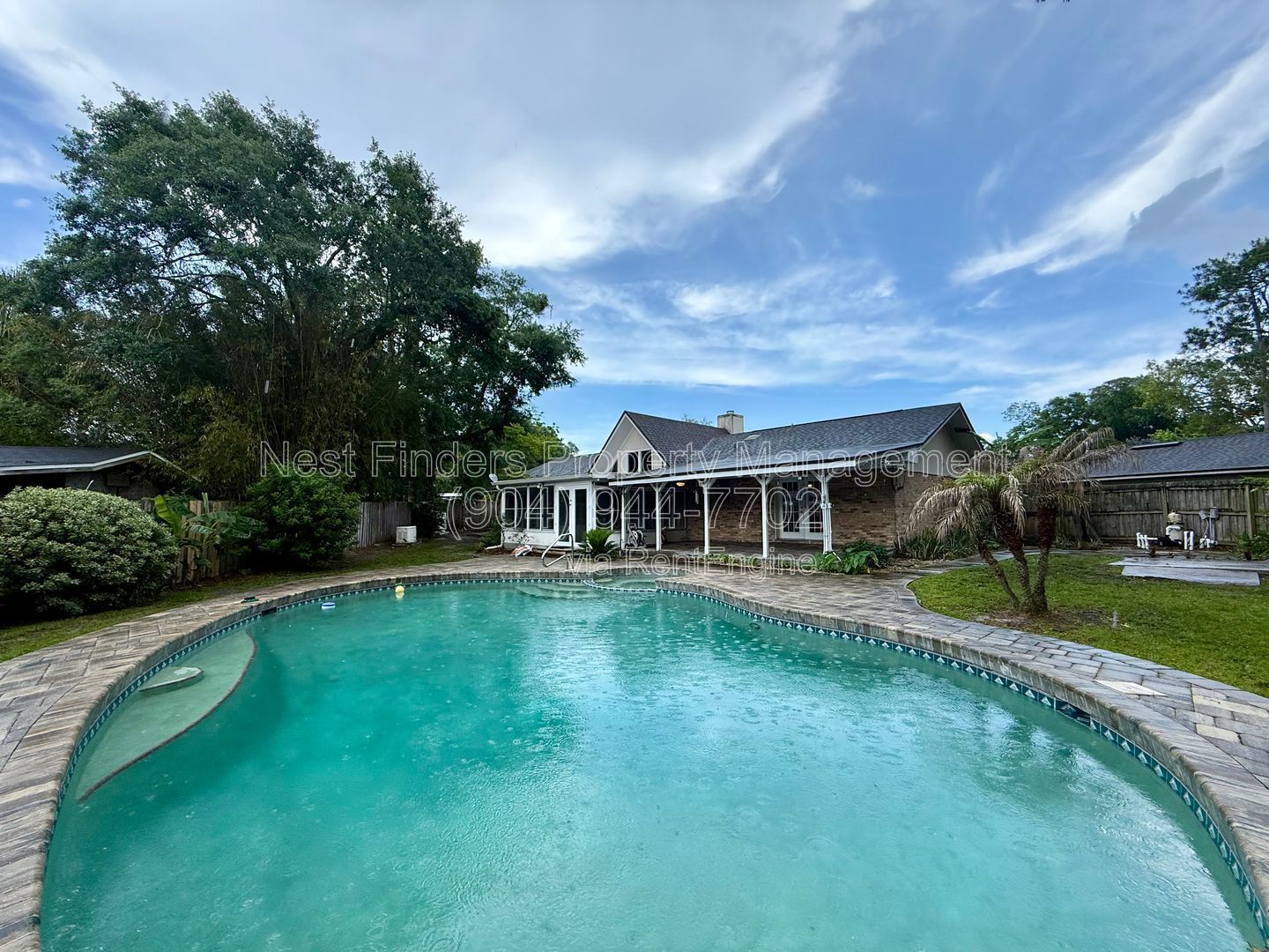 Enjoy a Florida POOL home lifestyle in this beautifully updated, all-brick home tucked away on a cul-de-sac with a FULLY-FENCED yard property image