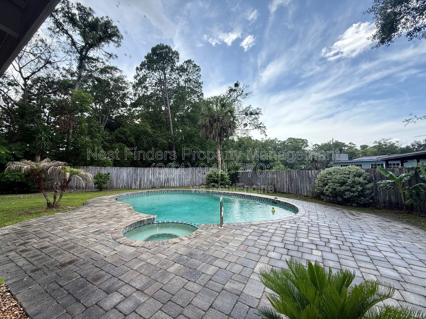 Enjoy a Florida POOL home lifestyle in this beautifully updated, all-brick home tucked away on a cul-de-sac with a FULLY-FENCED yard property image
