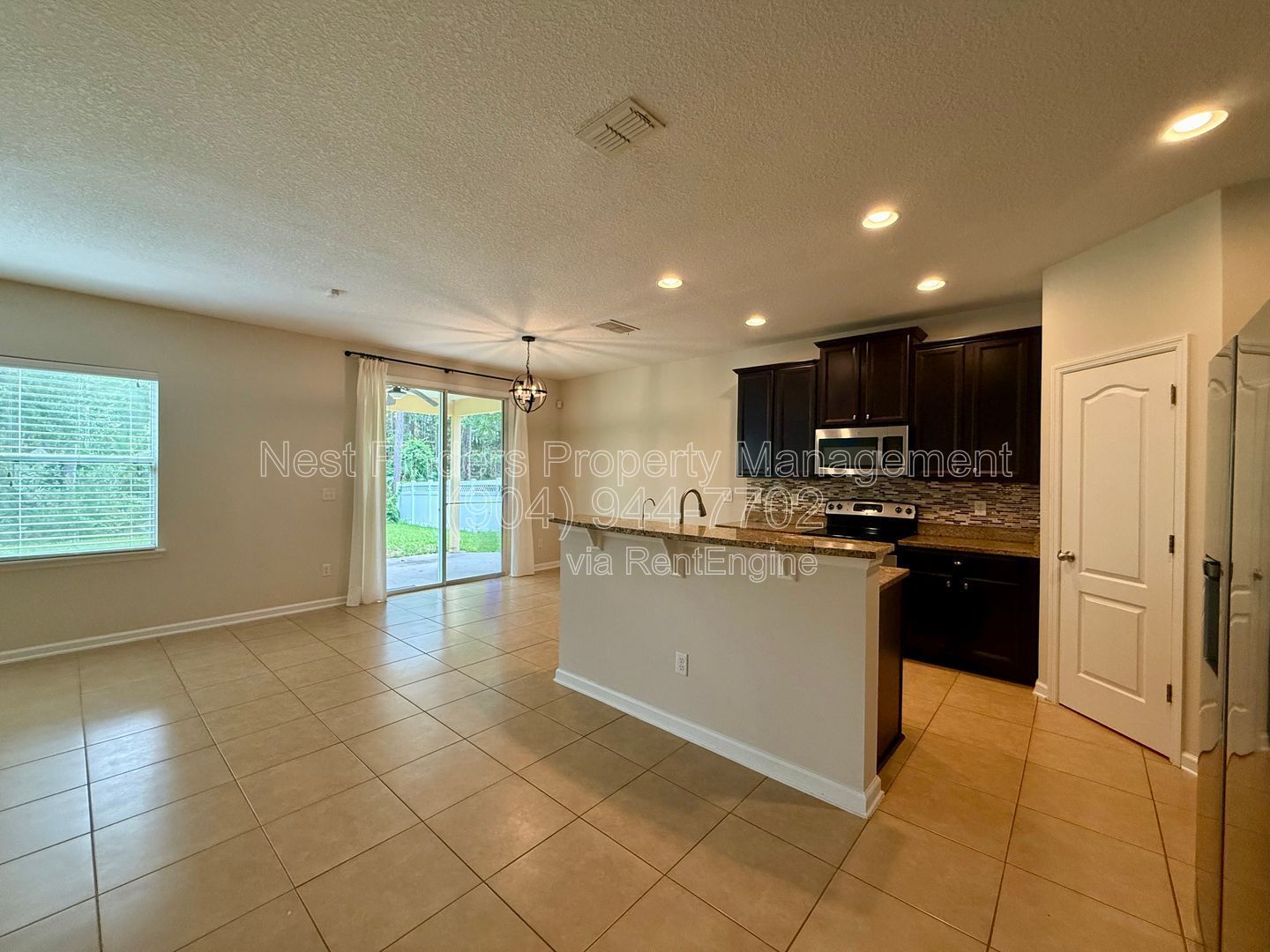 Beautiful 5-bedroom, 3-bath home on a preserve lot in the highly desirable Durbin Crossing community! property image