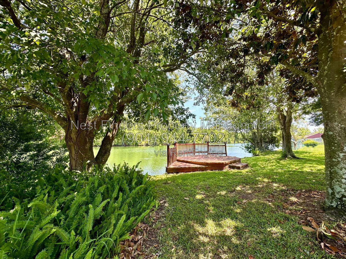 Charming, 3 bedroom / 2 bathroom home located on Spring fed lake with a dock! property image