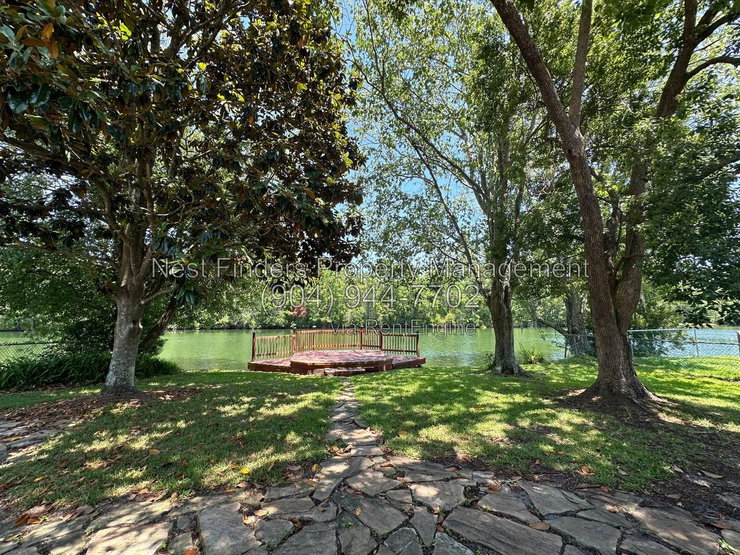 Charming, 3 bedroom / 2 bathroom home located on Spring fed lake with a dock! property image