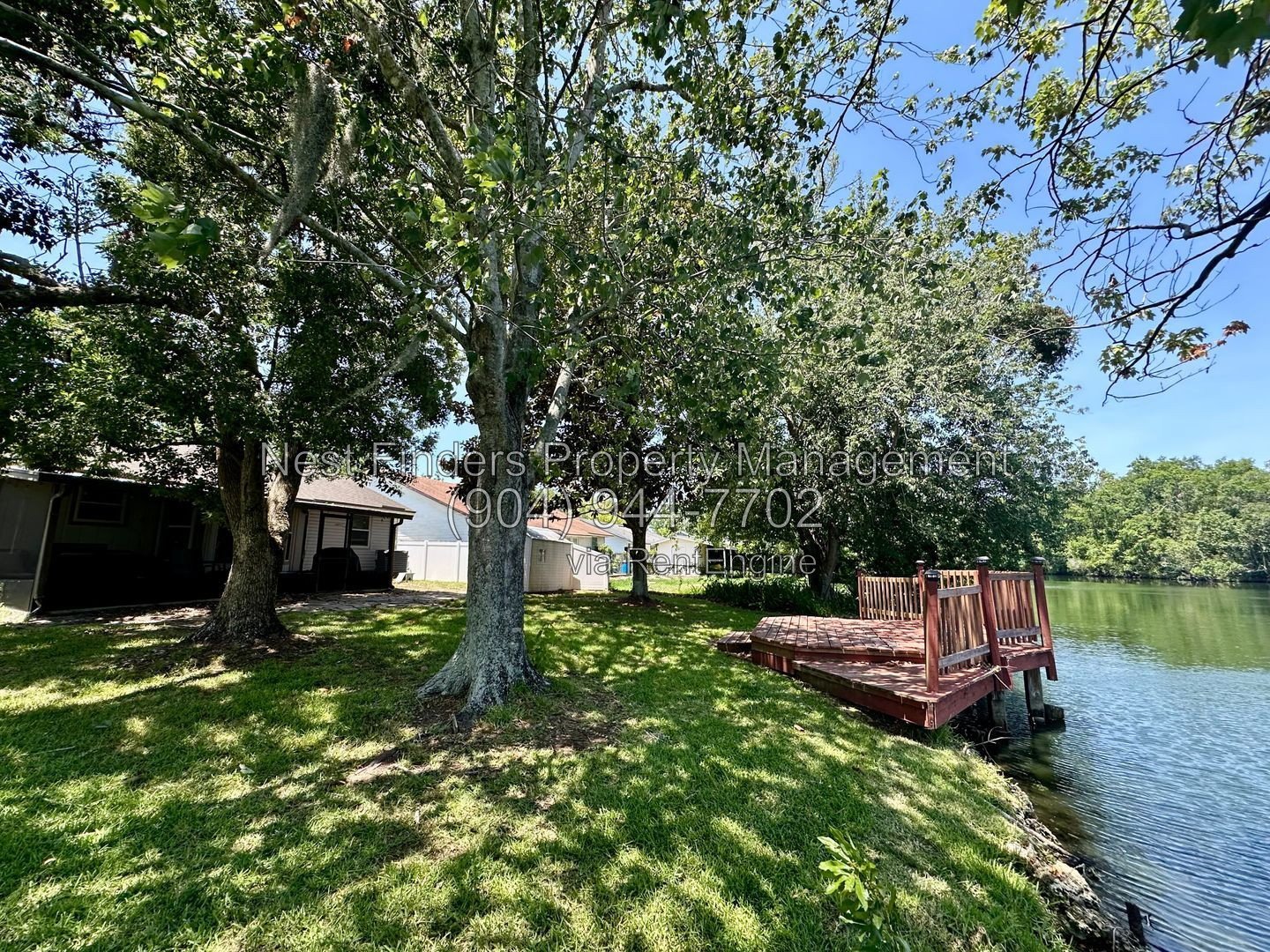 Charming, 3 bedroom / 2 bathroom home located on Spring fed lake with a dock! property image